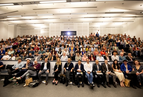 Delegates sitting in a lecture theare for the TPD in Focus symposium