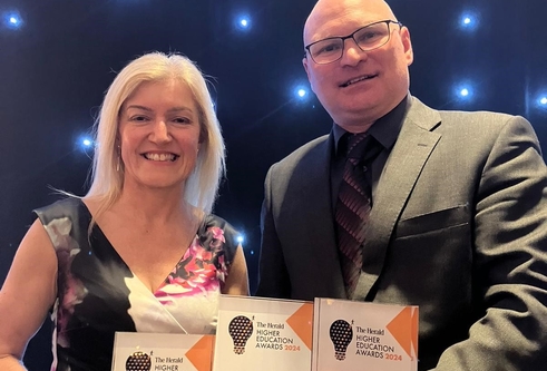 Hazel Ednie and Colin Murdoch with the three awards