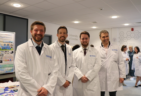 L-r - Cllr Steven Rome, Cllr John Alexander, Leader of Dundee City Council, Jacob Young, Parliamentary Under Secretary of State in the Department for Levelling Up, Housing and Communities, Professor Alessio Ciulli