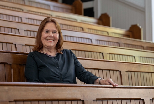 Lady Clark sitting in a Law lecture theatre