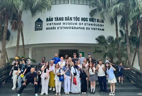 A group of students outside the Vietnam museum of ethnology