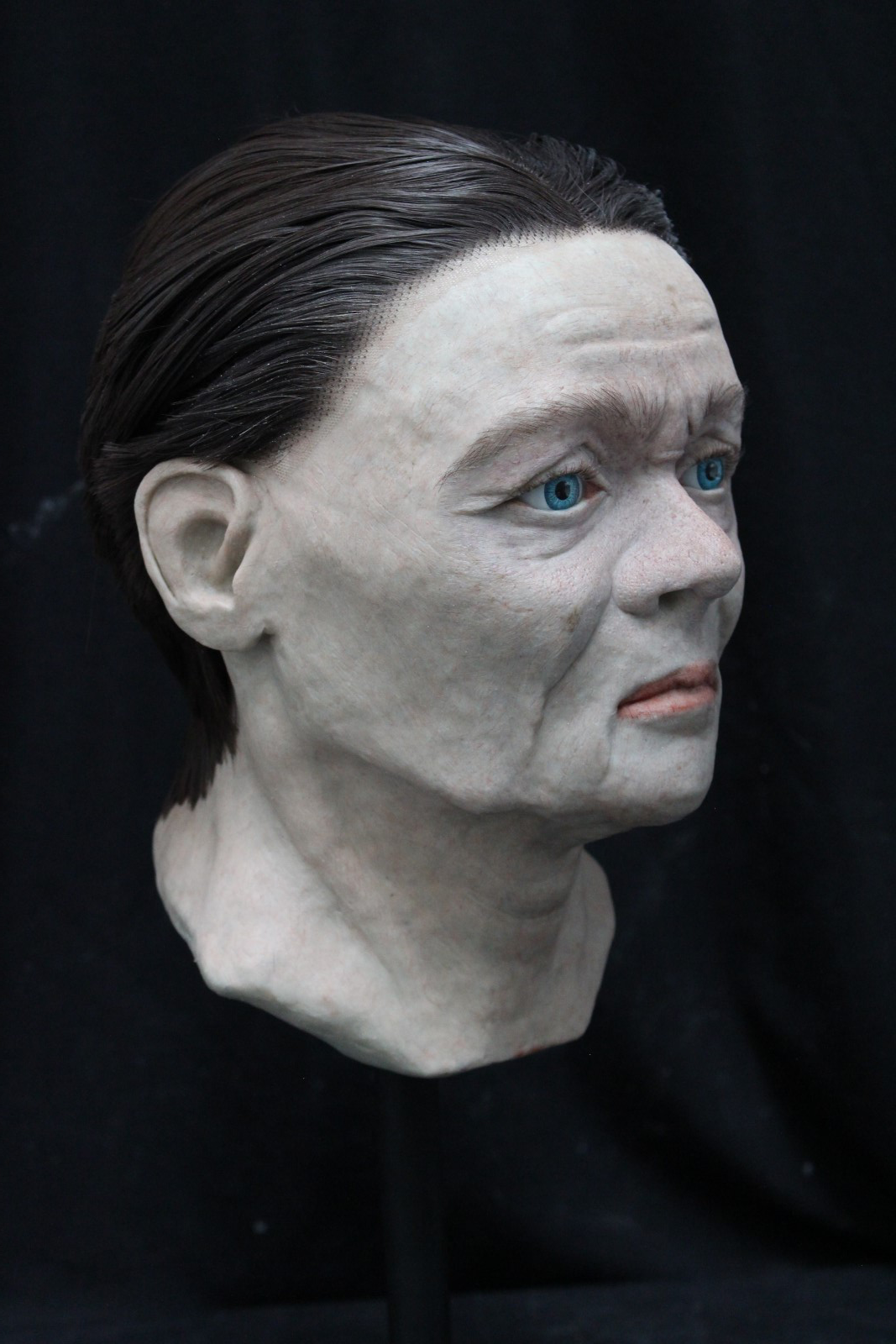 An archaeological facial reconstruction of John Hand, right side profile view