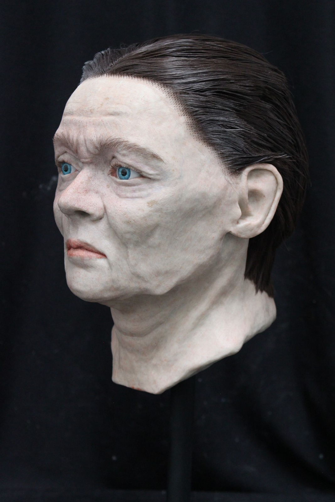 An archaeological facial reconstruction of John Hand, left side profile view
